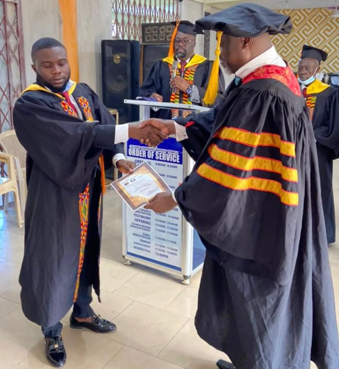 Graduate receiving certificate
